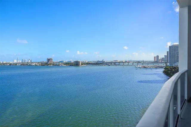 a view of a lake and a yard