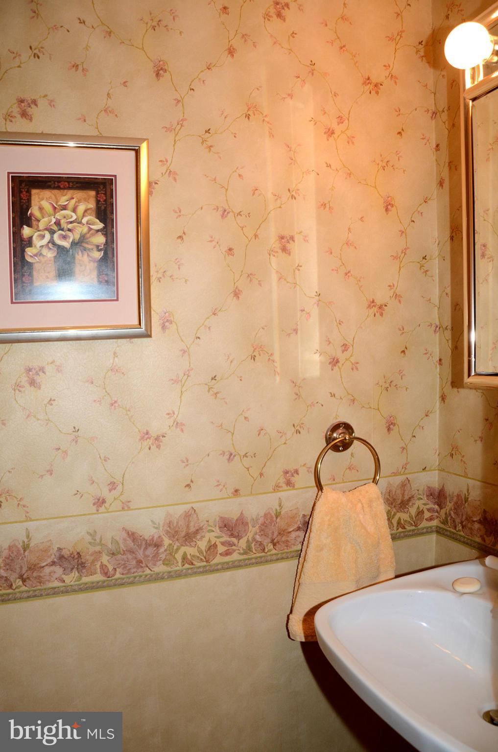 11446 Waterview Cluster Reston, VA 20190 - Photo 15 of 30 a bathroom with a sink and a mirror