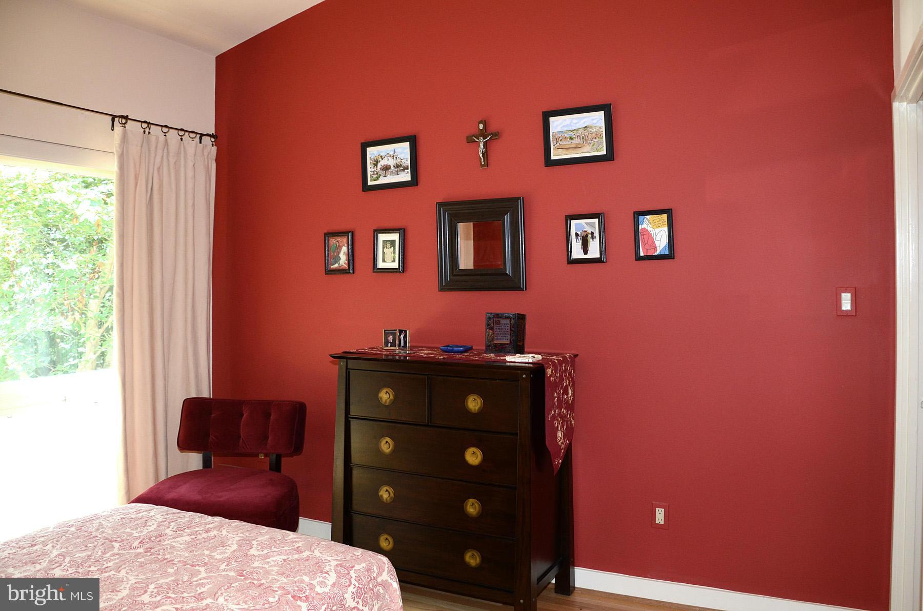 11446 Waterview Cluster Reston, VA 20190 - Photo 17 of 30 a bedroom with a bed and a closet