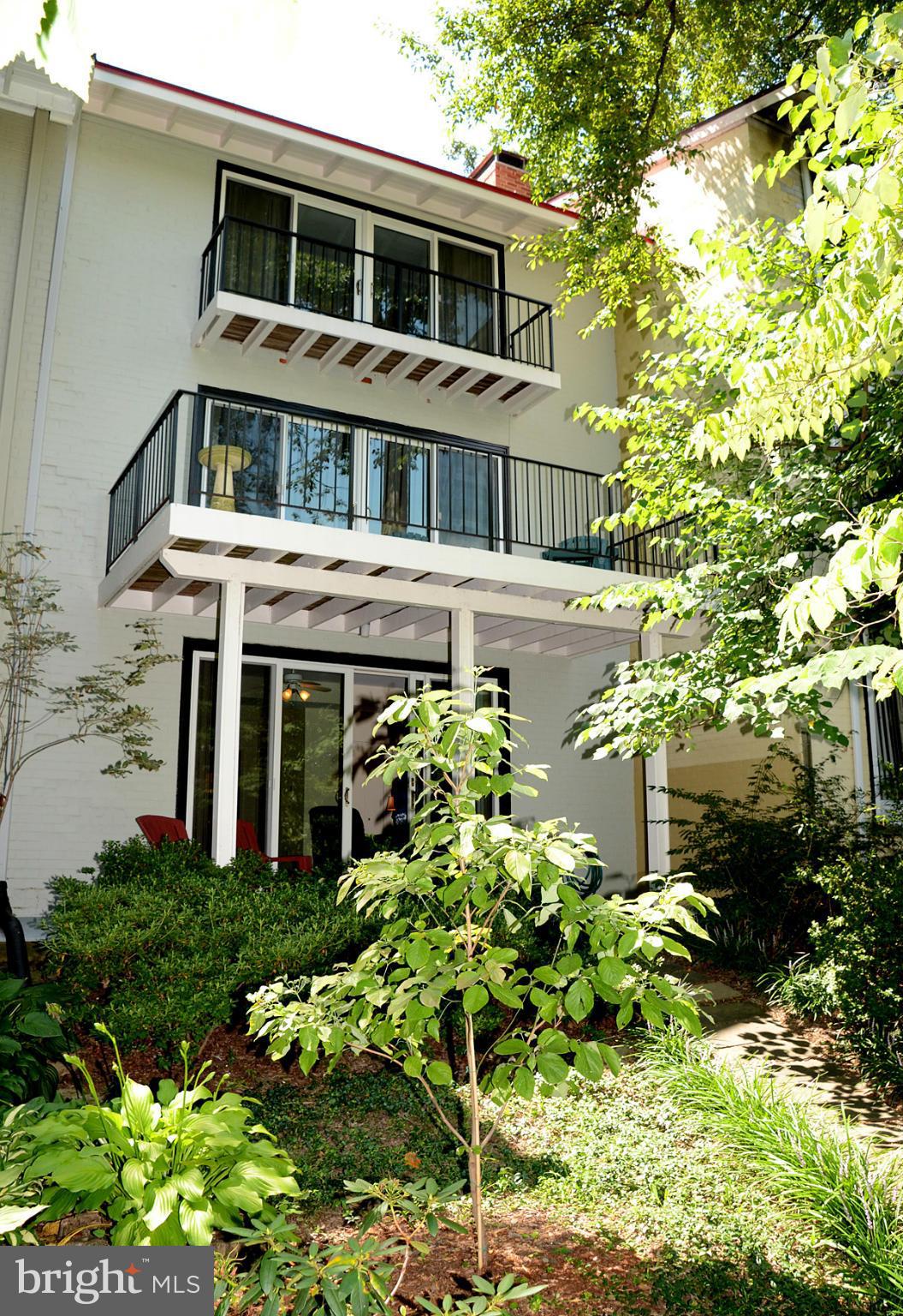11446 Waterview Cluster Reston, VA 20190 - Photo 3 of 30 a house view with a garden space