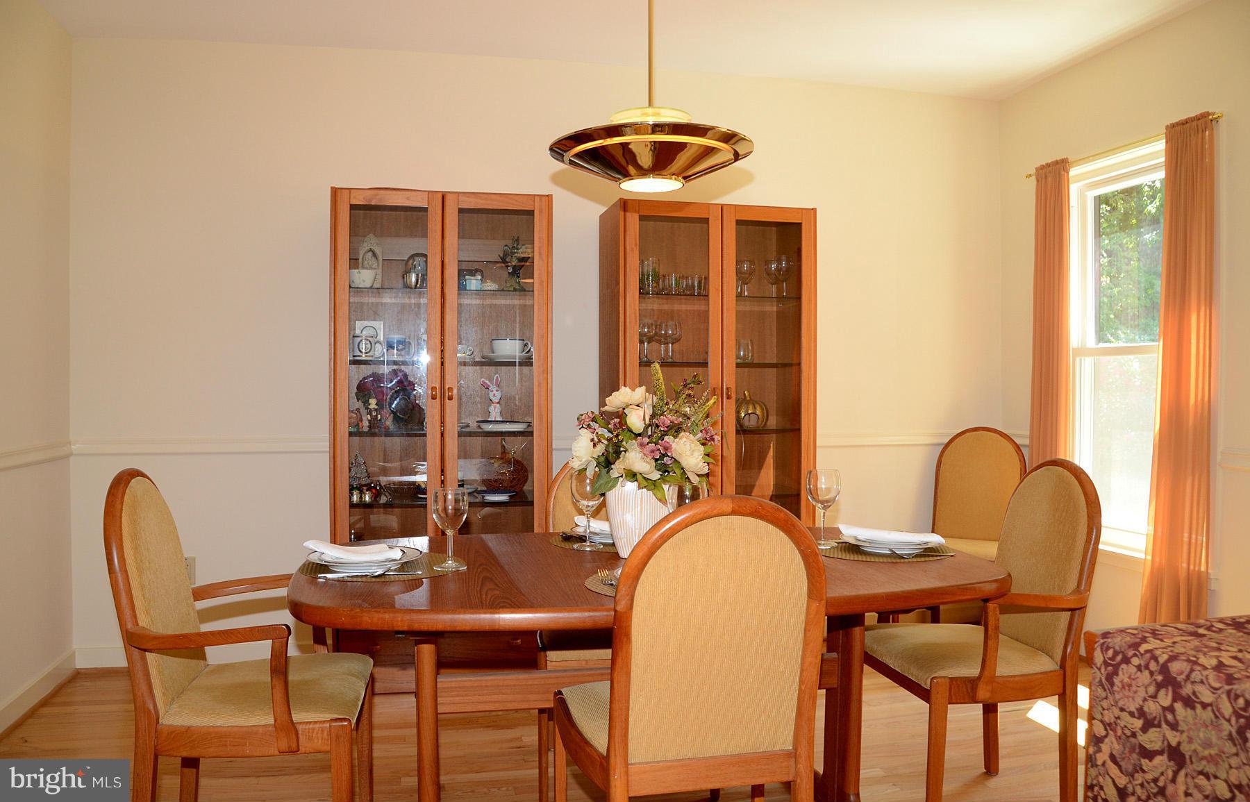 11446 Waterview Cluster Reston, VA 20190 - Photo 7 of 30 a dining room with furniture and window