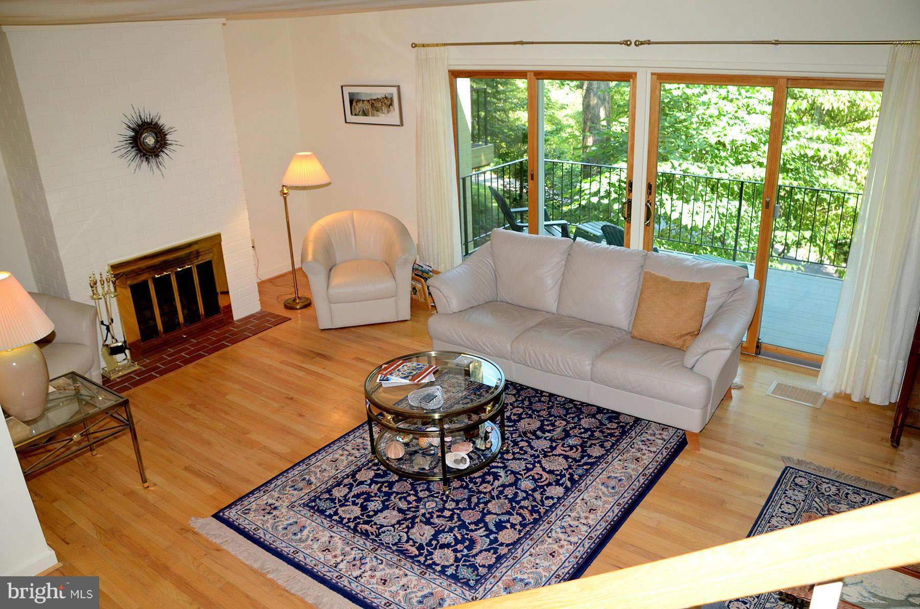 11446 Waterview Cluster Reston, VA 20190 - Photo 9 of 30 a living room with furniture and a rug