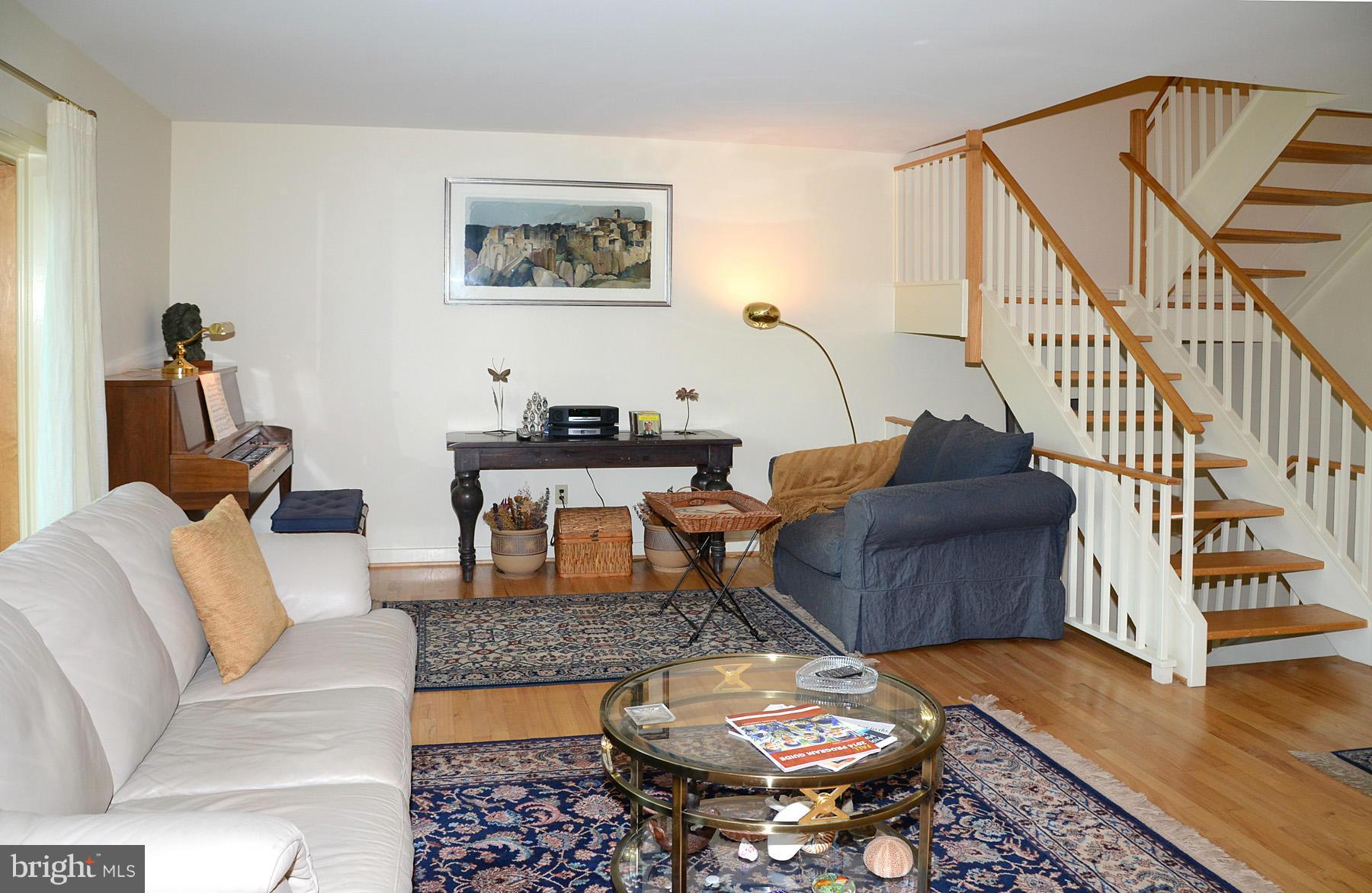 11446 Waterview Cluster Reston, VA 20190 - Photo 10 of 30 a living room with furniture and wooden floor