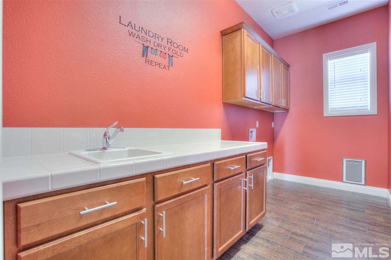 9800 Shadowless Trail Reno, NV 89521 - Photo 26 of 36 a bathroom with a sink and a mirror