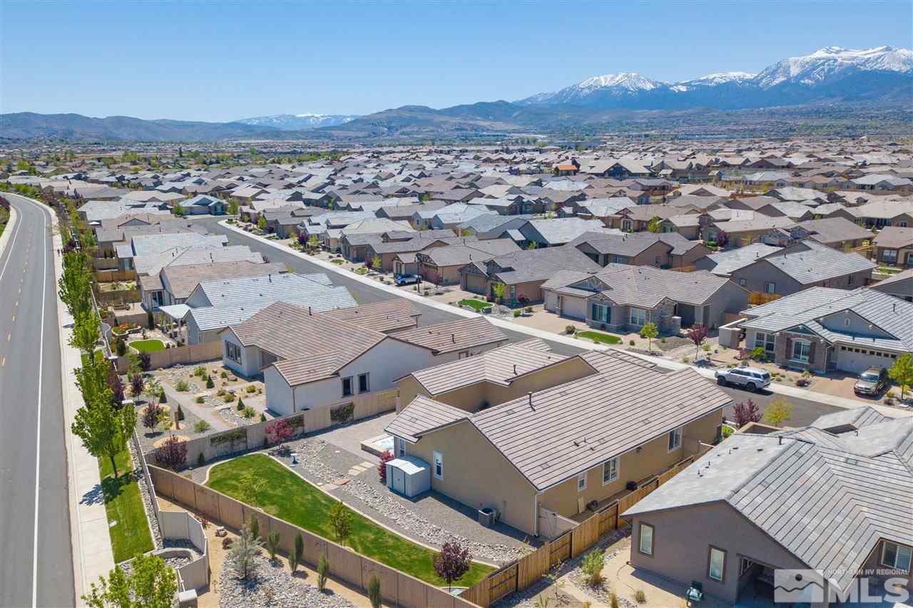 9800 Shadowless Trail Reno, NV 89521 - Photo 35 of 36 an aerial view of a house with a mountain