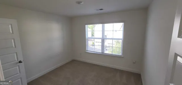 an empty room with a window