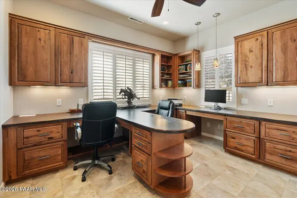 a kitchen with a stove a sink and a refrigerator