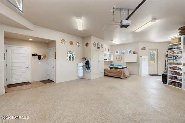 a view of livingroom with furniture and white walls