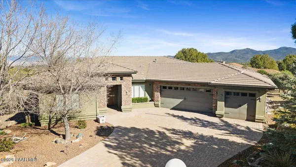 a view of a house with a snow