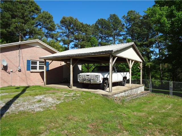 1329 Oak Grove Road Goodspring, TN 38460 - Photo 3 of 20 a view of a house with backyard and sitting area