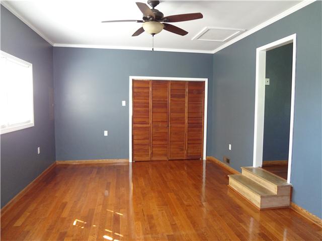 1329 Oak Grove Road Goodspring, TN 38460 - Photo 10 of 20 wooden floor and window in an empty room