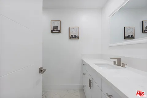 a white bath tub sitting in a bathroom
