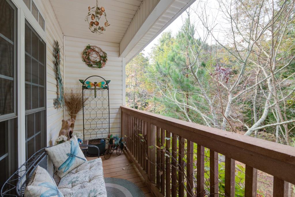 1170 Calhoun Road Dahlonega, GA 30533 - Photo 15 of 34 a view of a porch with furniture