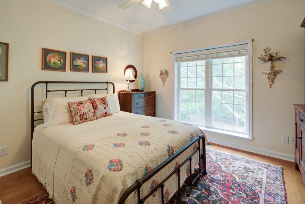 1170 Calhoun Road Dahlonega, GA 30533 - Photo 20 of 34 a bedroom with a bed and a window