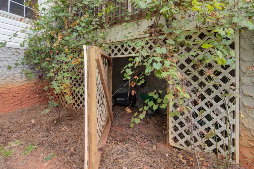 1170 Calhoun Road Dahlonega, GA 30533 - Photo 23 of 34 a view of a wooden door and an outdoor space