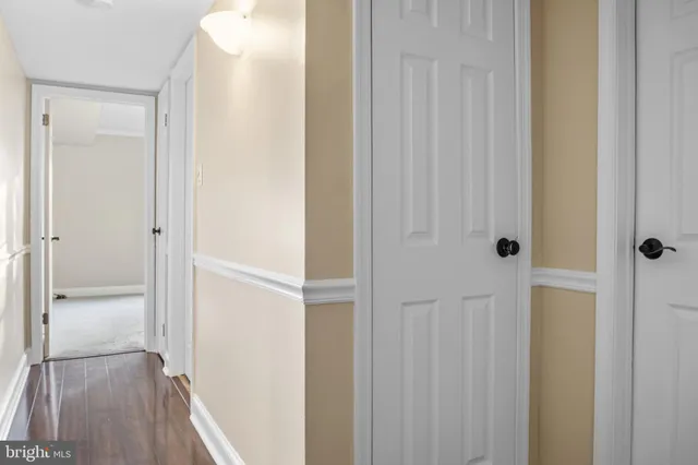 a view of a bathroom from a hallway