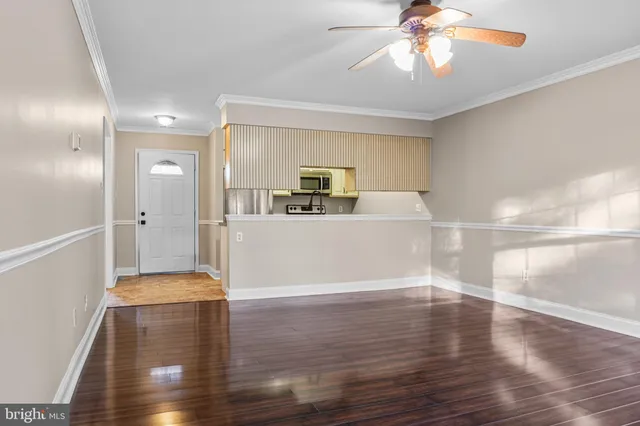 a view of a living room and a chandelier