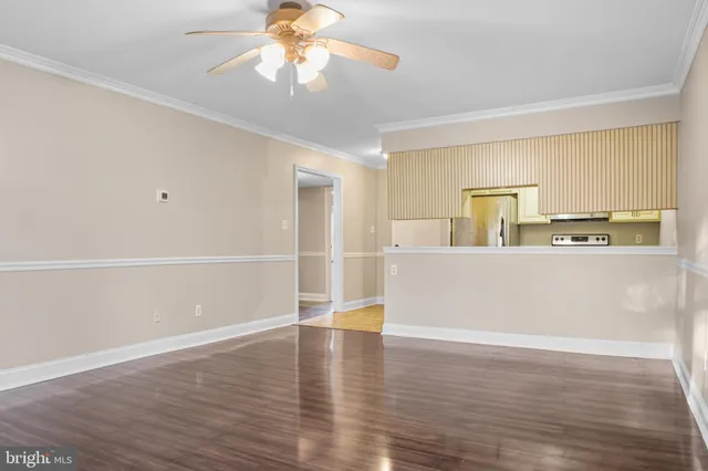 a view of a kitchen with wooden floor