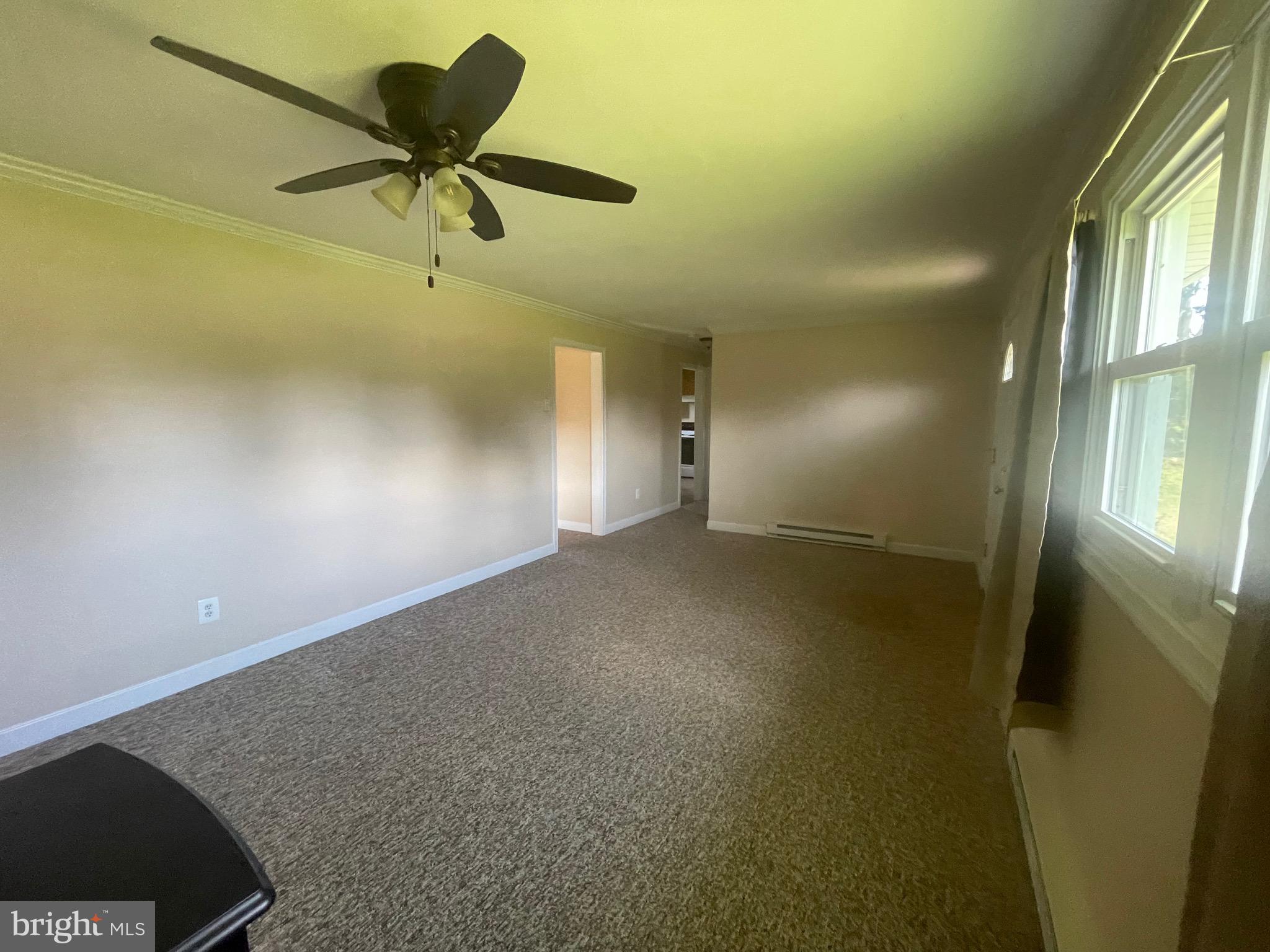 580 Cullen Road Lincoln University, PA 19352 - Photo 5 of 14 Living room into hallway