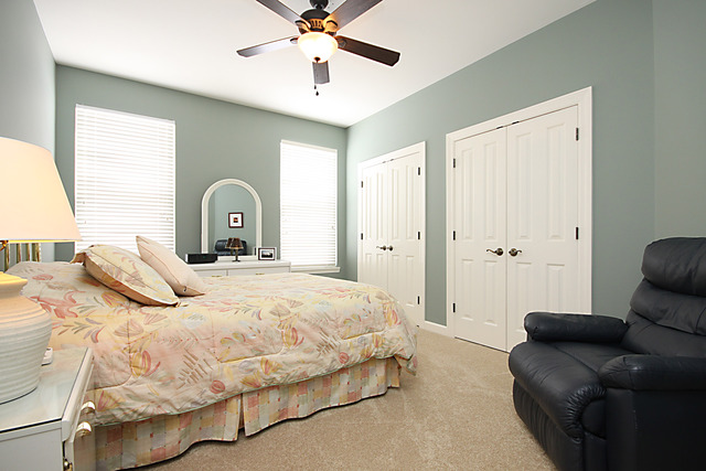 901 Price Road Sugar Grove, IL 60554 - Photo 14 of 25 a bedroom with a bed and ceiling fan