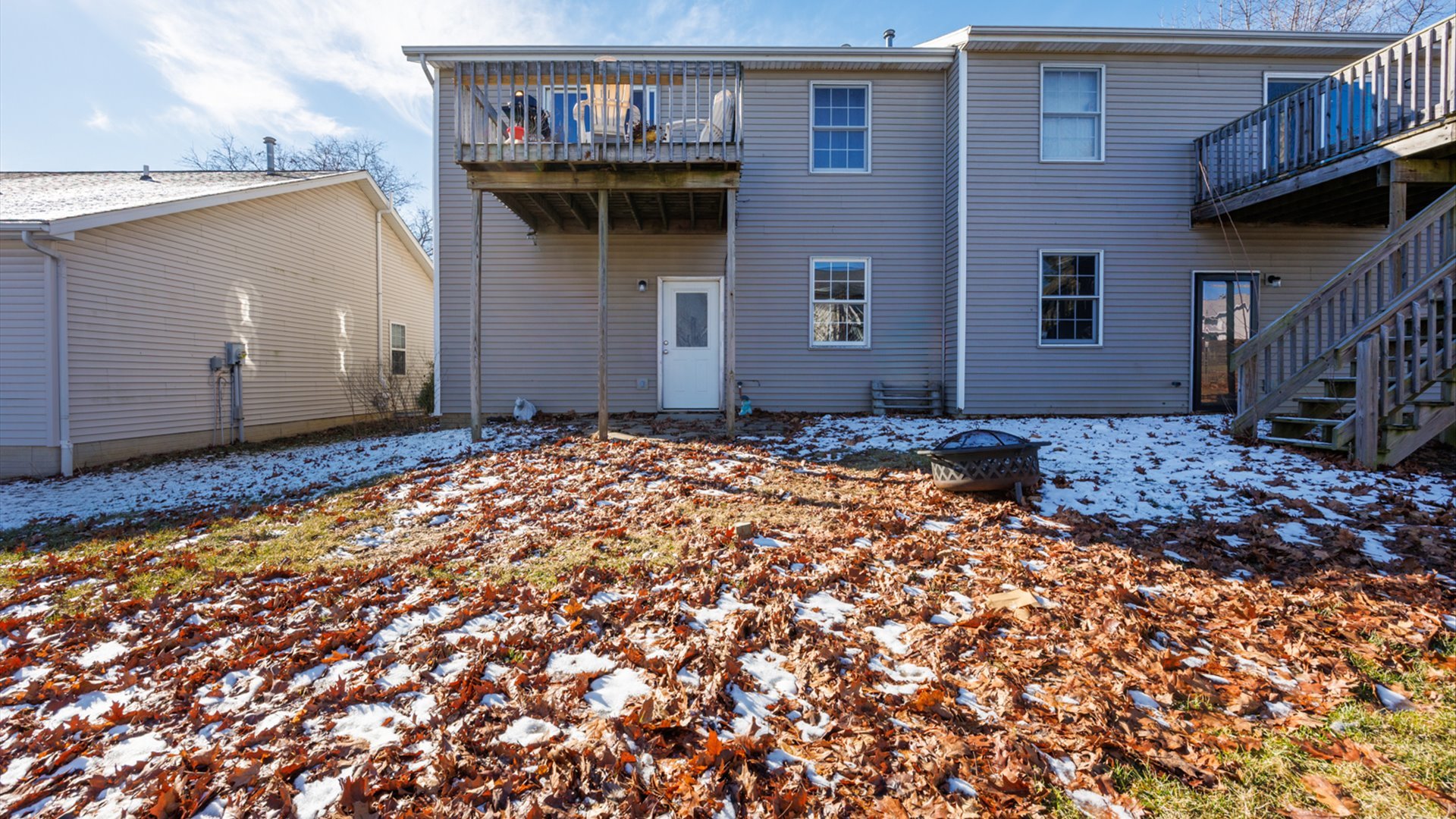 67 Oak Park Road Bloomington, IL 61701 - Photo 29 of 34 a front view of a house with a yard