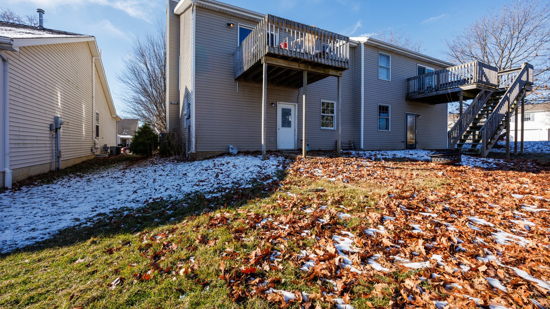 67 Oak Park Road Bloomington, IL 61701 - Photo 30 of 34 a view of a house with a yard