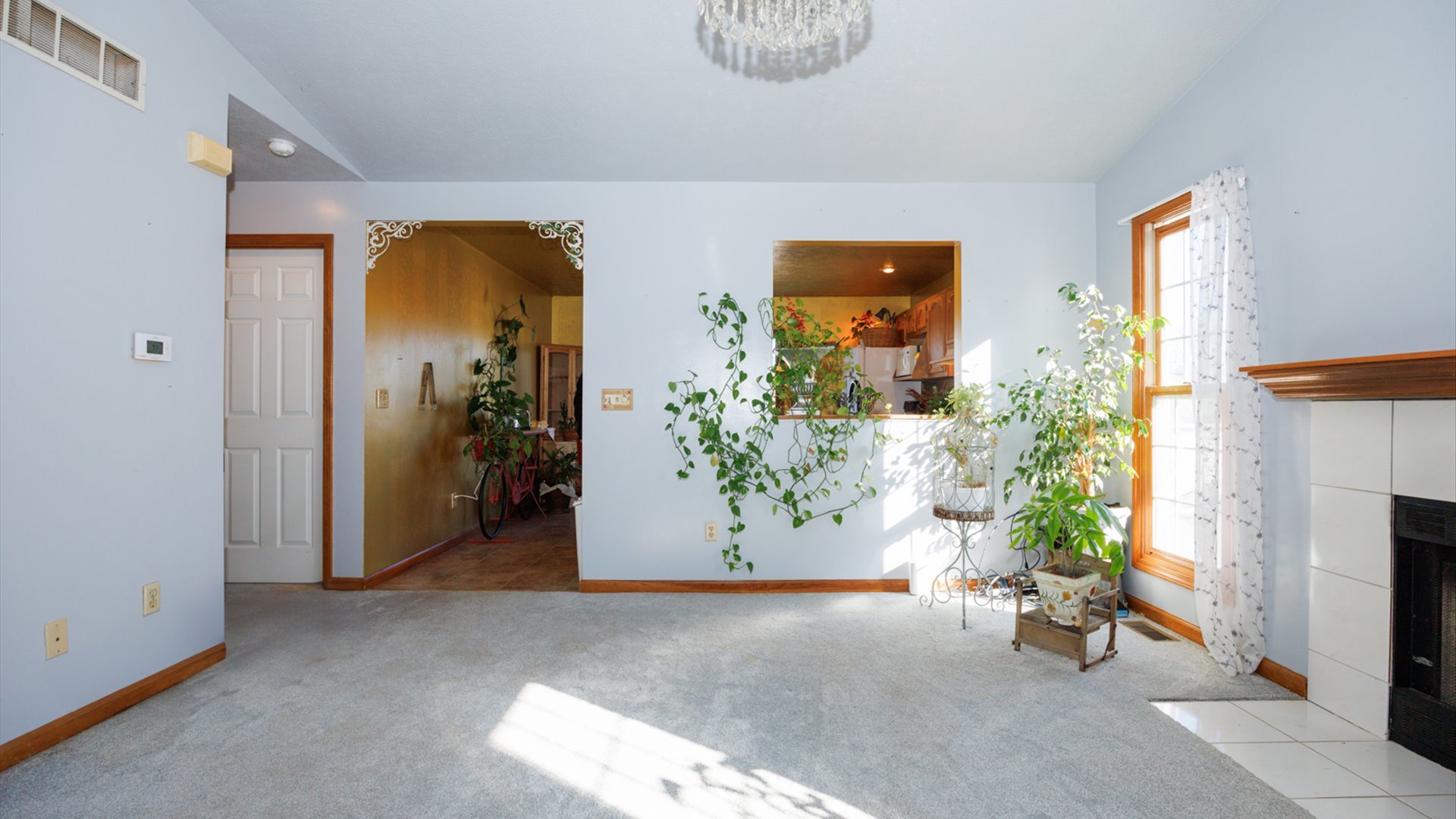 67 Oak Park Road Bloomington, IL 61701 - Photo 4 of 34 a view of a livingroom with furniture and a window