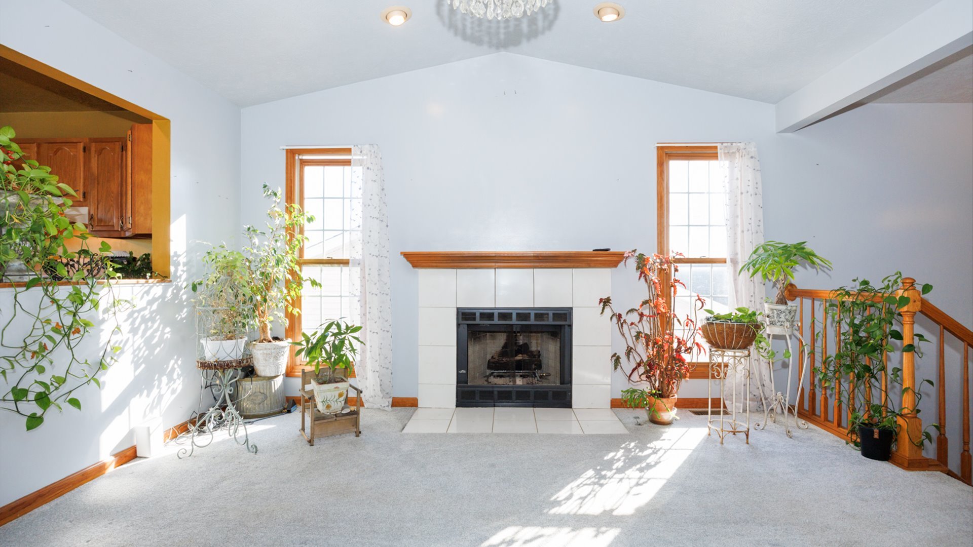 67 Oak Park Road Bloomington, IL 61701 - Photo 8 of 34 a living room with furniture and a fireplace