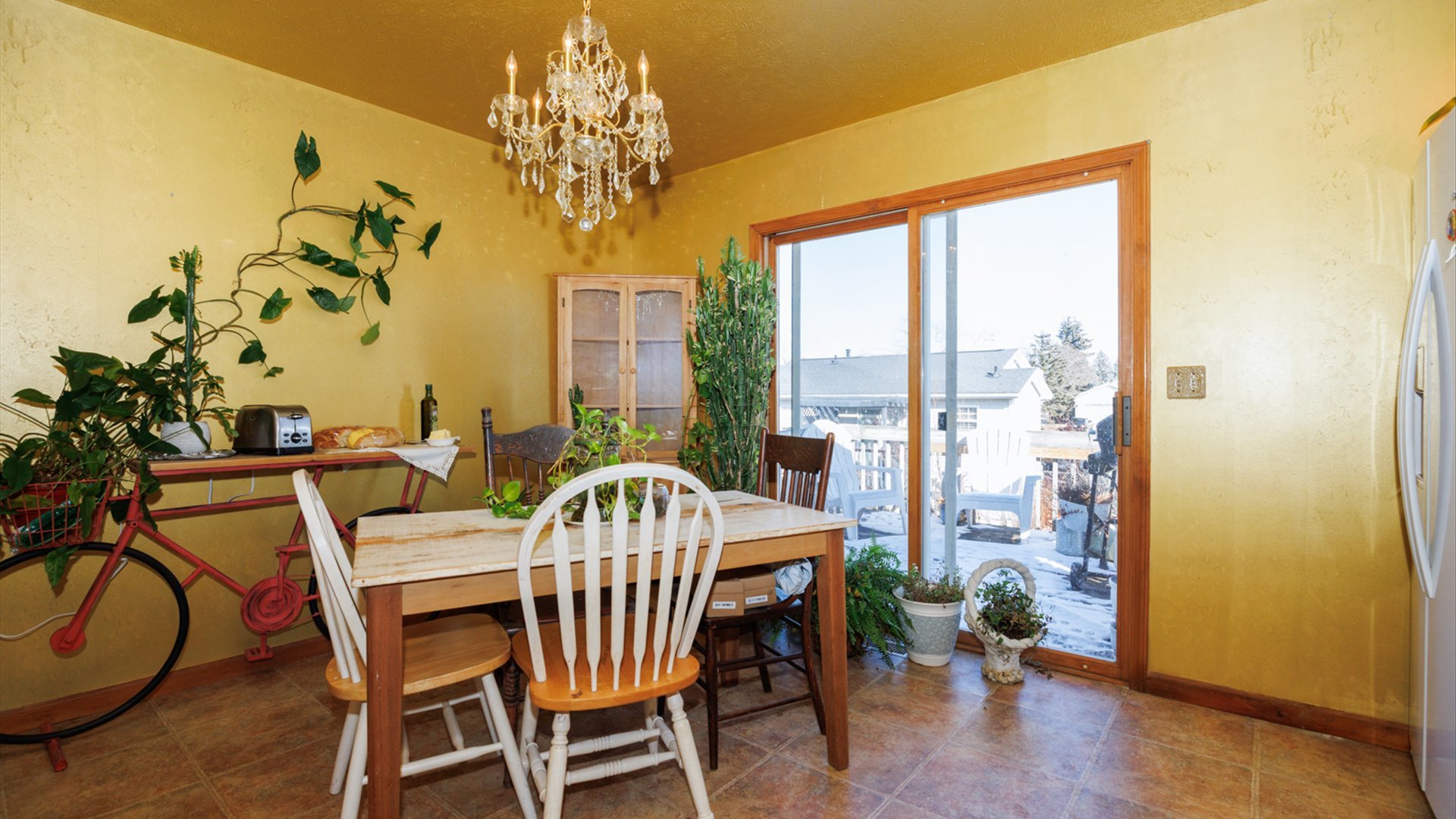67 Oak Park Road Bloomington, IL 61701 - Photo 10 of 34 a view of a dining room with furniture window and wooden floor