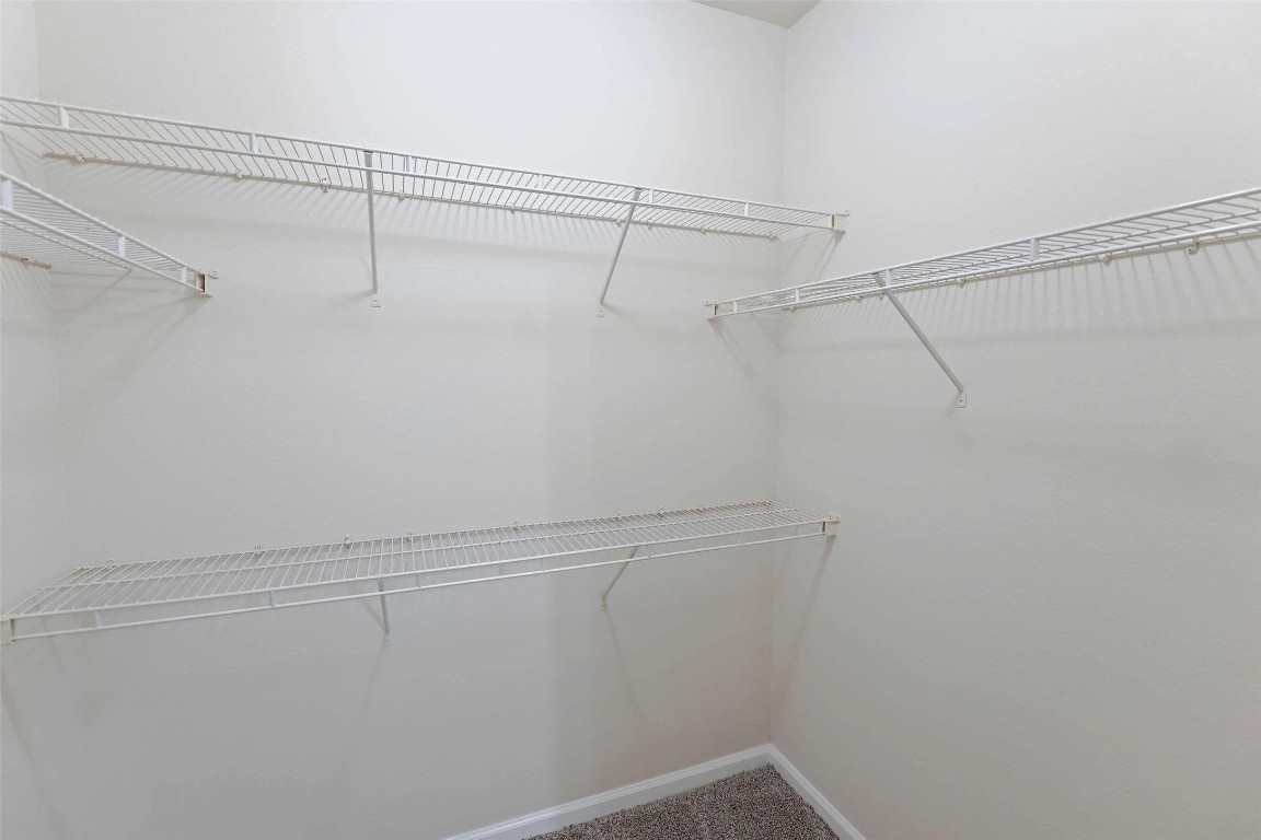 10505 South I-35 Frontage Road, Unit 222 Austin, TX 78747 - Photo 15 of 25 a view of a room with racks on the wall