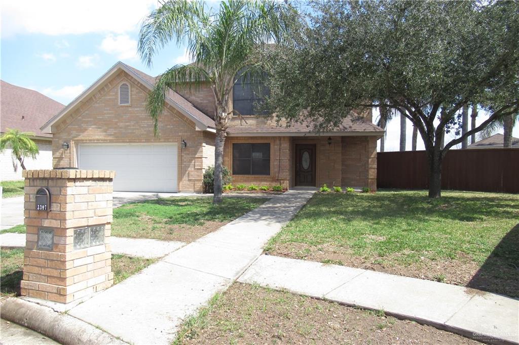 3307 Santa Teresa Mission, TX 78572 - Photo 28 of 33 a front view of house with yard and green space