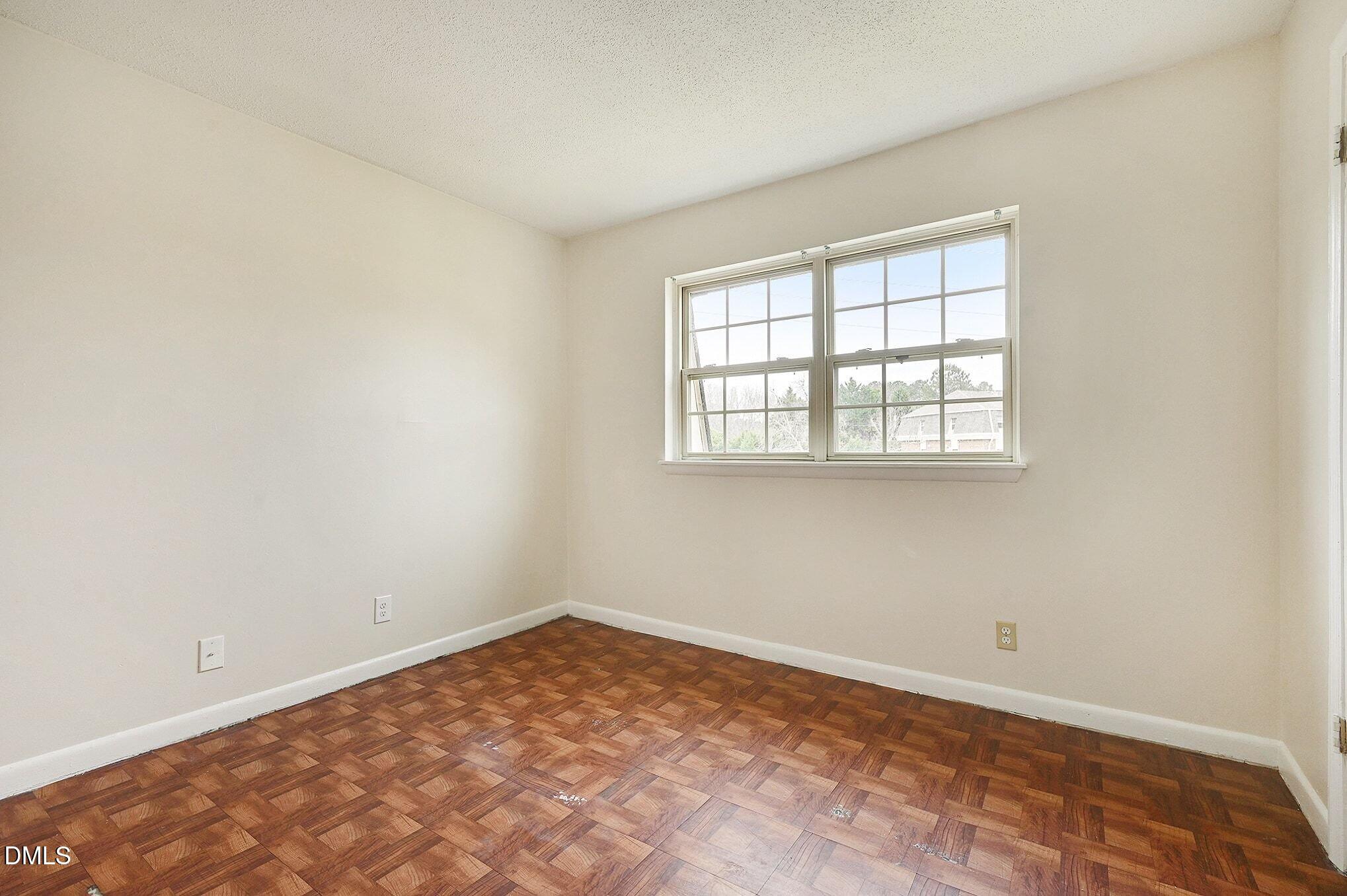 501 Jones Ferry Road, Unit N9 Carrboro, NC 27510 - Photo 13 of 22 an empty room with a window