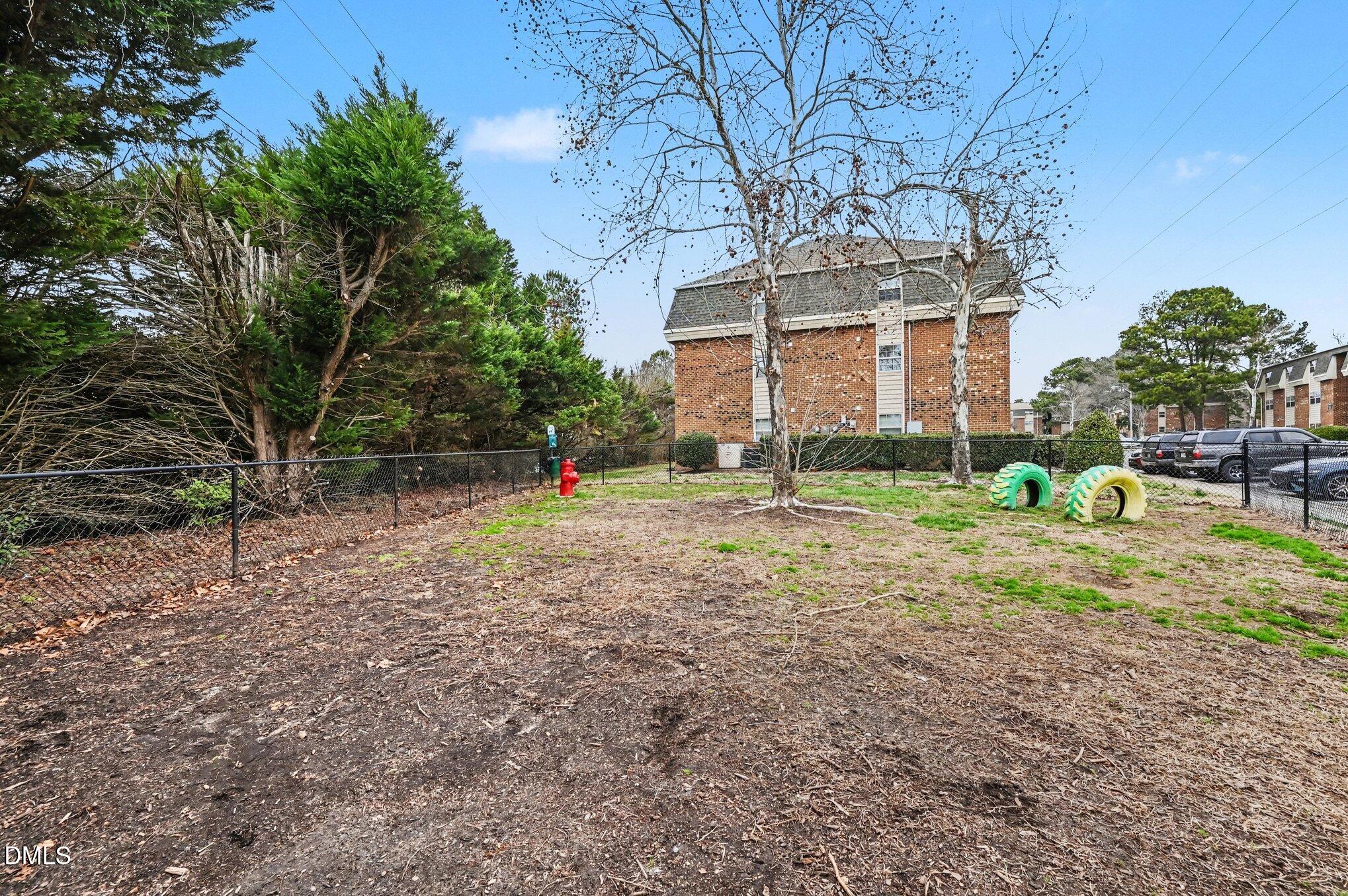 501 Jones Ferry Road, Unit N9 Carrboro, NC 27510 - Photo 15 of 22 a view of a house with a yard
