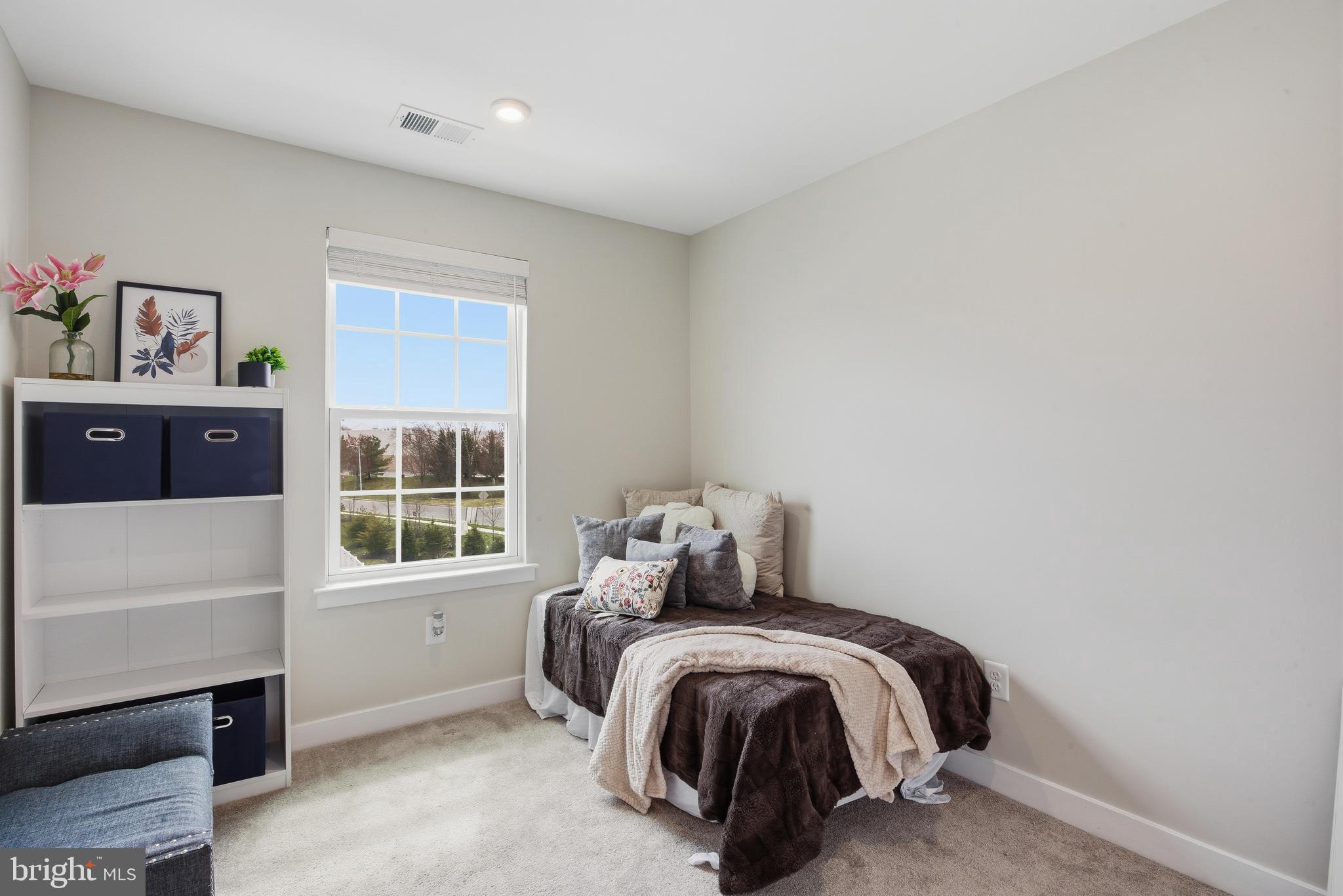 103 Freedom Way Sicklerville, NJ 08081 - Photo 26 of 43 a bedroom with a bed and a window