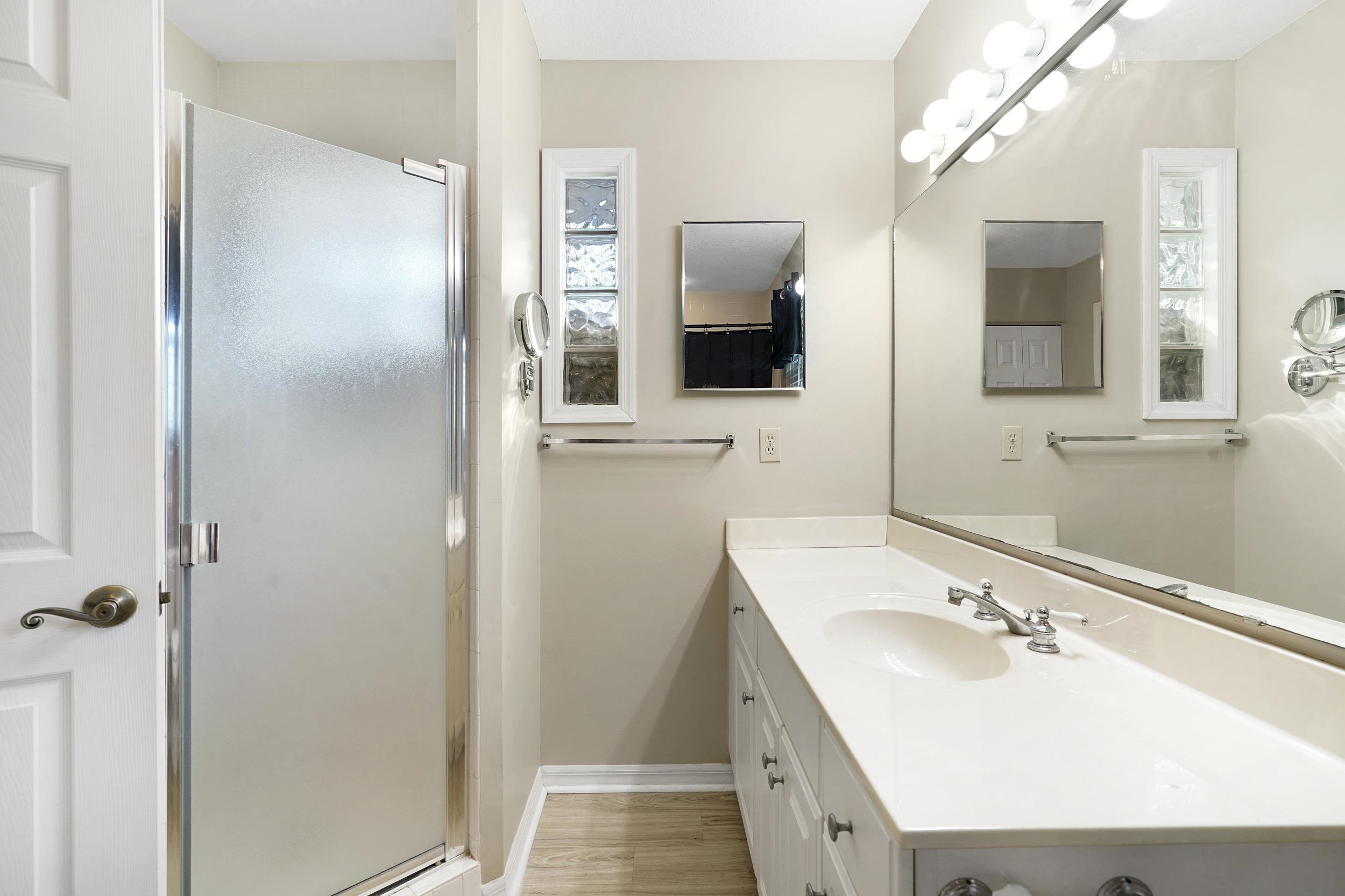 607 West Bianca Circle St. Augustine, FL 32086 - Photo 18 of 35 a bathroom with a sink and a mirror