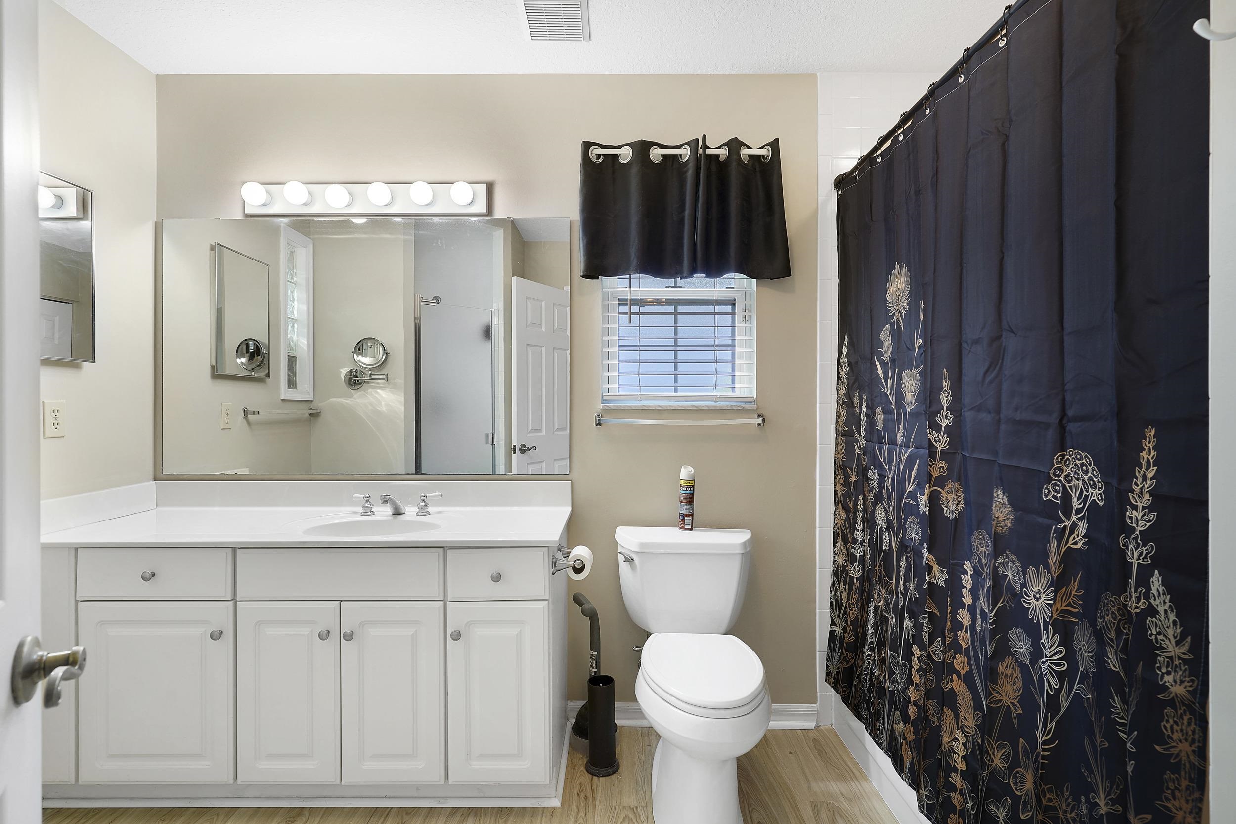 607 West Bianca Circle St. Augustine, FL 32086 - Photo 22 of 35 a bathroom with a toilet sink and shower