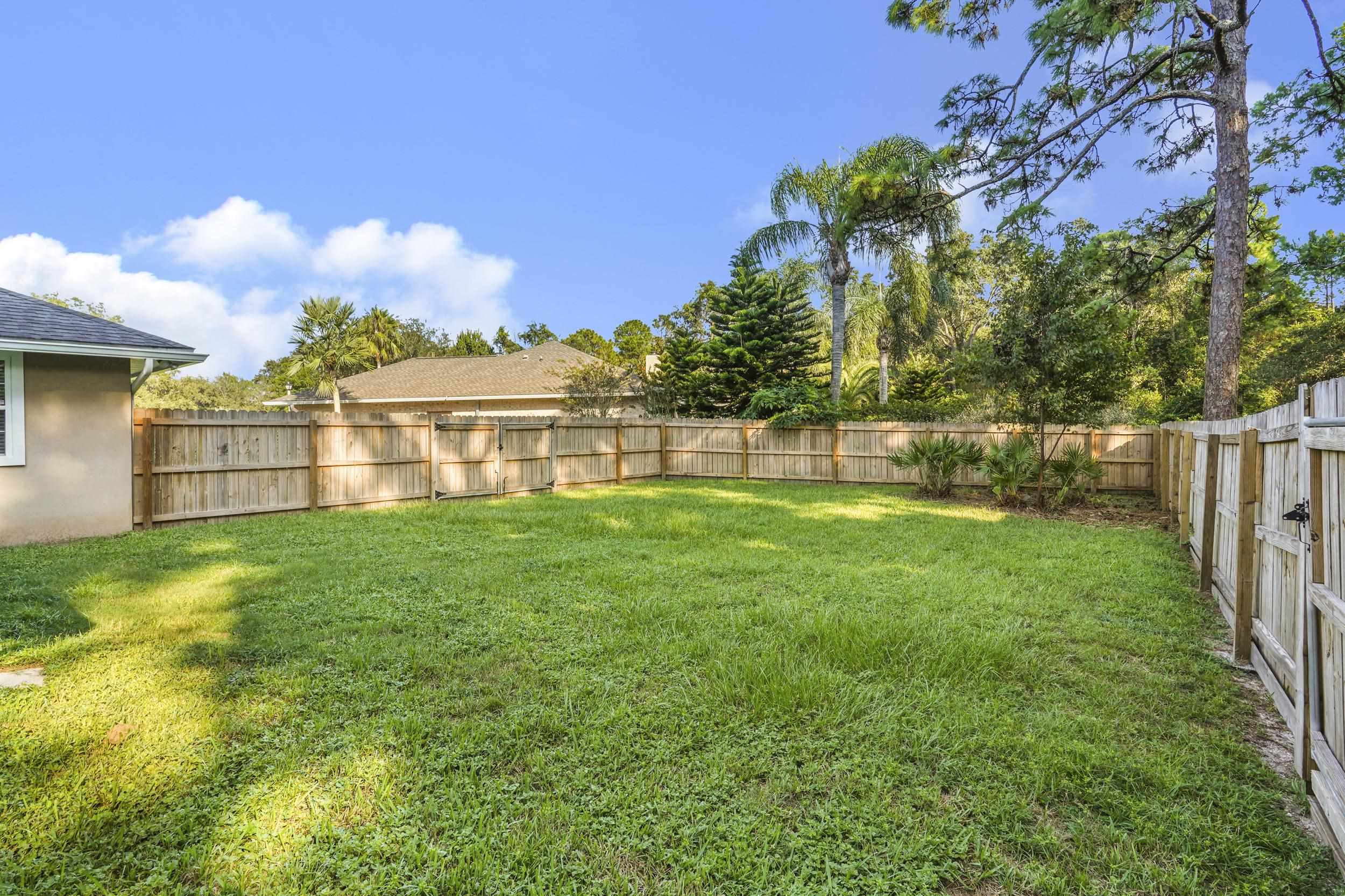 607 West Bianca Circle St. Augustine, FL 32086 - Photo 4 of 35 a view of a house with a yard
