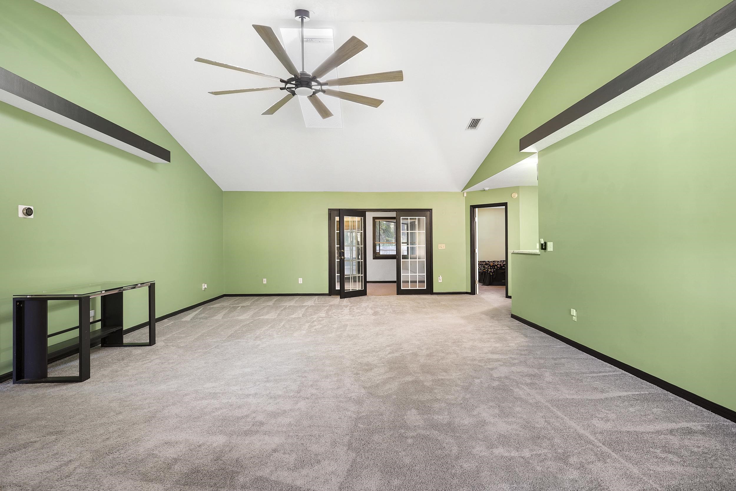 607 West Bianca Circle St. Augustine, FL 32086 - Photo 9 of 35 a view of an empty room with a window