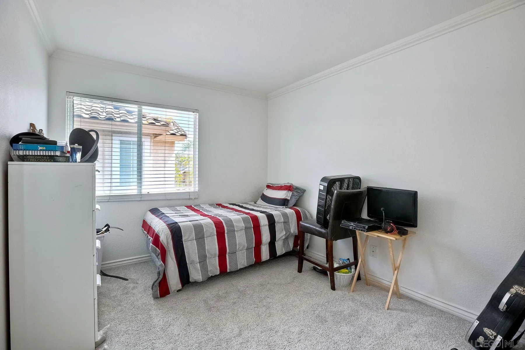 2479 Golfcrest Loop Chula Vista, CA 91915 - Photo 19 of 25 a bed room with a bed furniture and a window