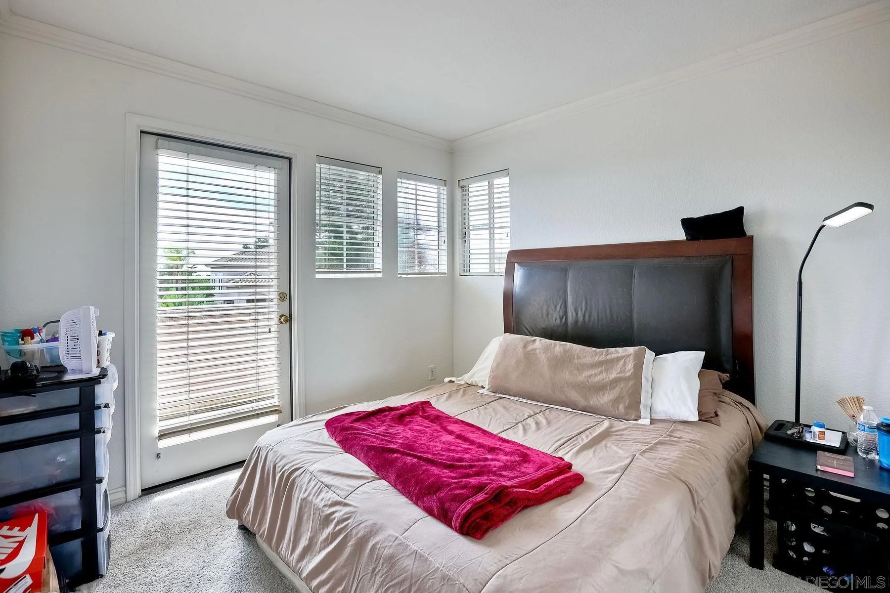 2479 Golfcrest Loop Chula Vista, CA 91915 - Photo 20 of 25 a bedroom with a bed and a window