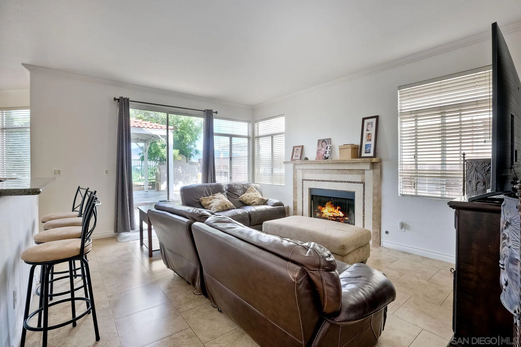 2479 Golfcrest Loop Chula Vista, CA 91915 - Photo 10 of 25 a living room with furniture and a fireplace