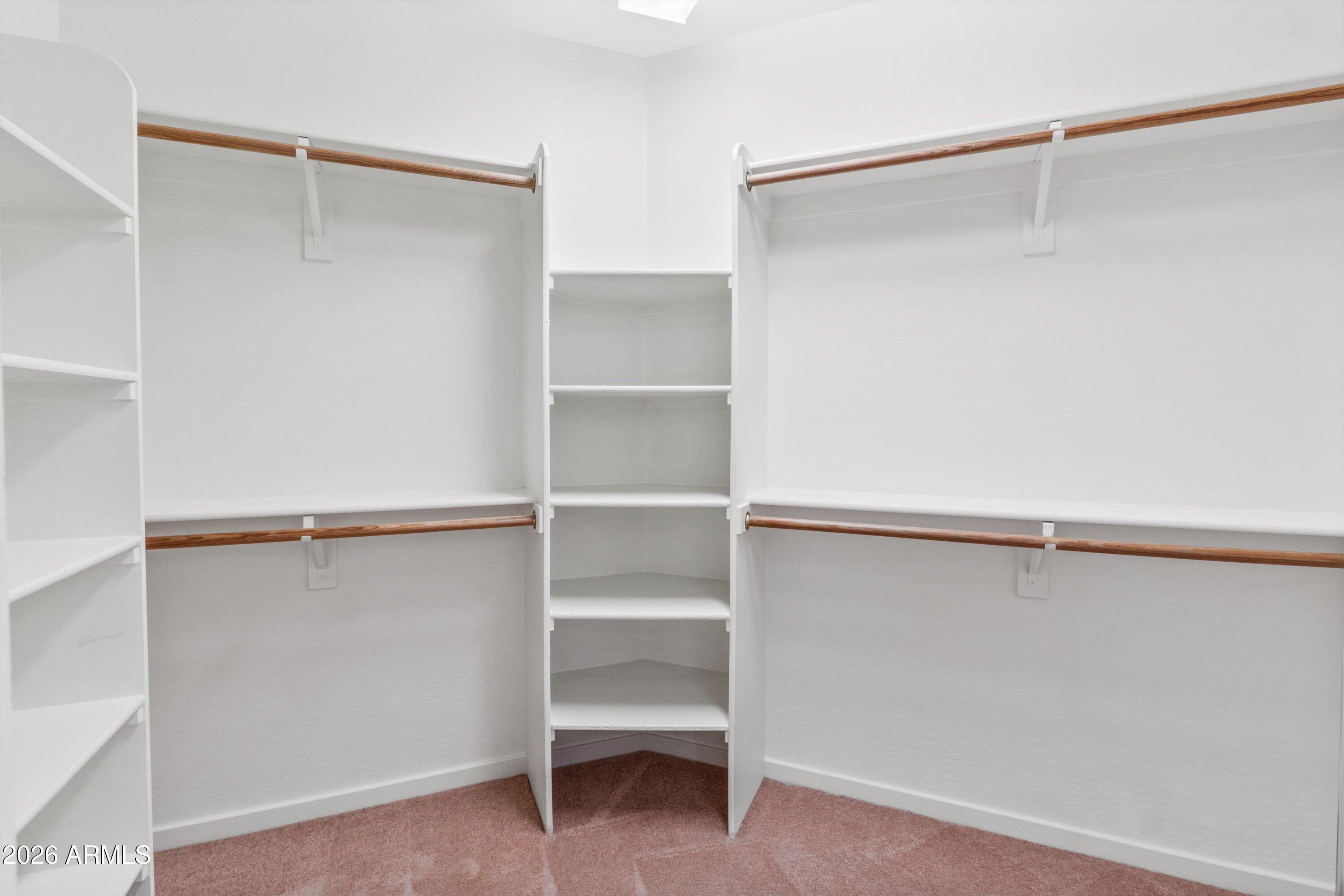 2130 East Beautiful Lane Phoenix, AZ 85042 - Photo 23 of 35 a view of an empty walk in closet