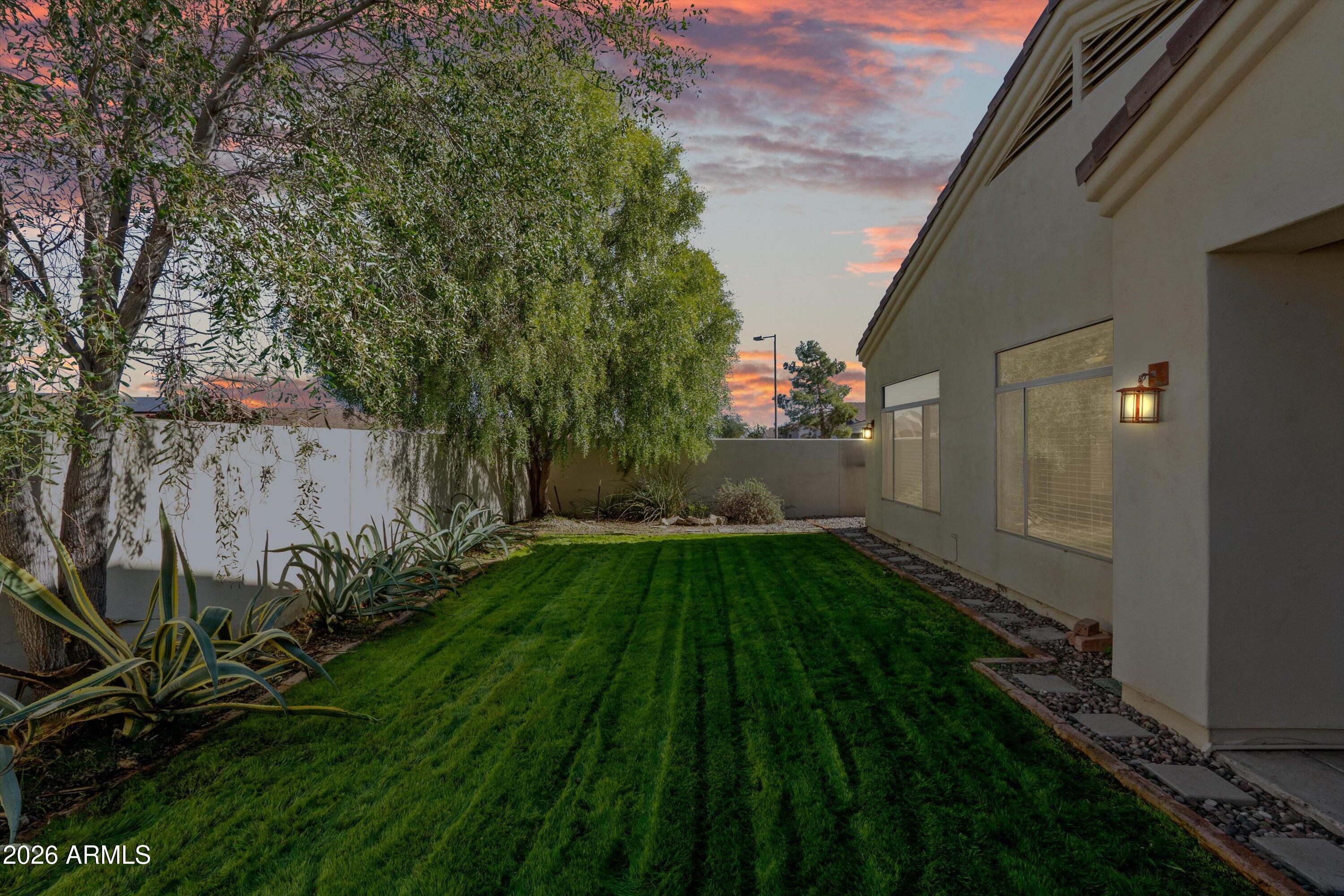 2130 East Beautiful Lane Phoenix, AZ 85042 - Photo 24 of 35 a backyard of a house with lots of green space
