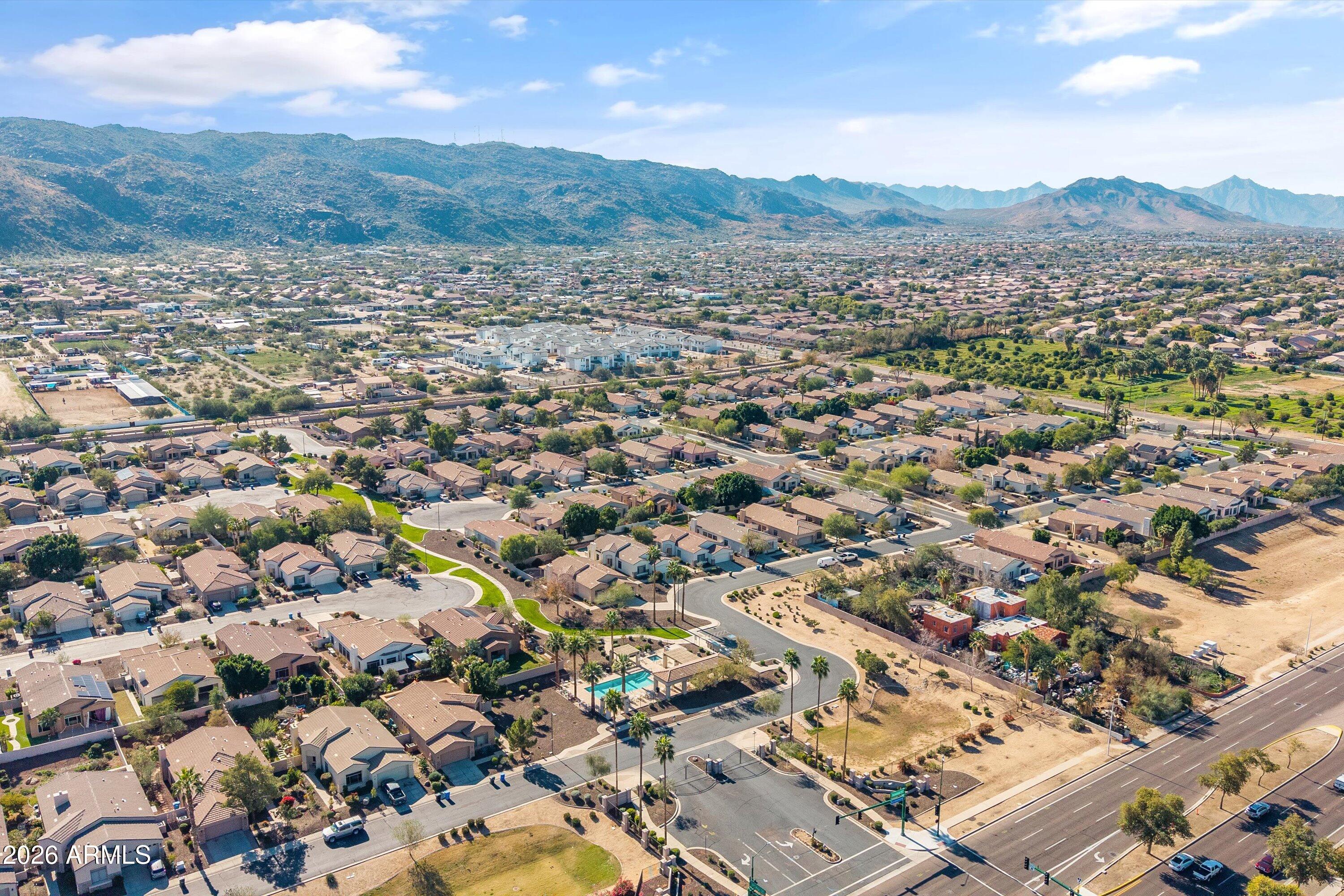 2130 East Beautiful Lane Phoenix, AZ 85042 - Photo 33 of 35 an aerial view of residential houses with outdoor space