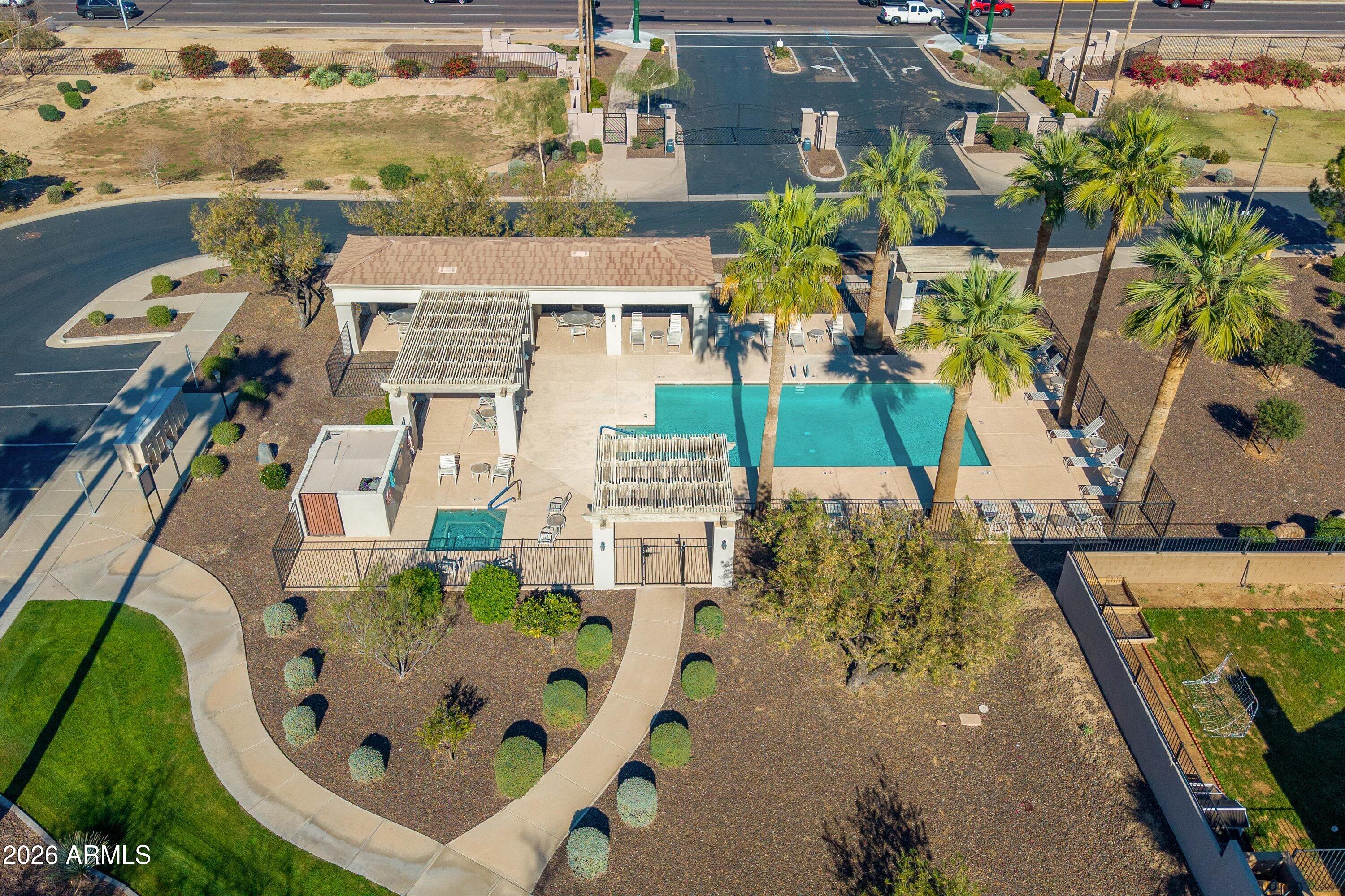 2130 East Beautiful Lane Phoenix, AZ 85042 - Photo 34 of 35 an aerial view of a house with a garden and trees