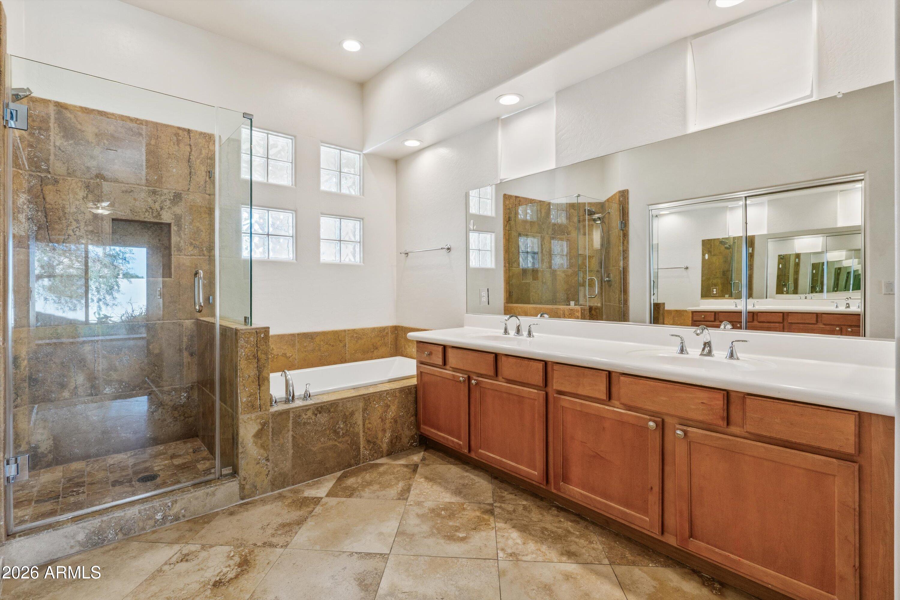 2130 East Beautiful Lane Phoenix, AZ 85042 - Photo 7 of 35 a bathroom with a sink and a mirror