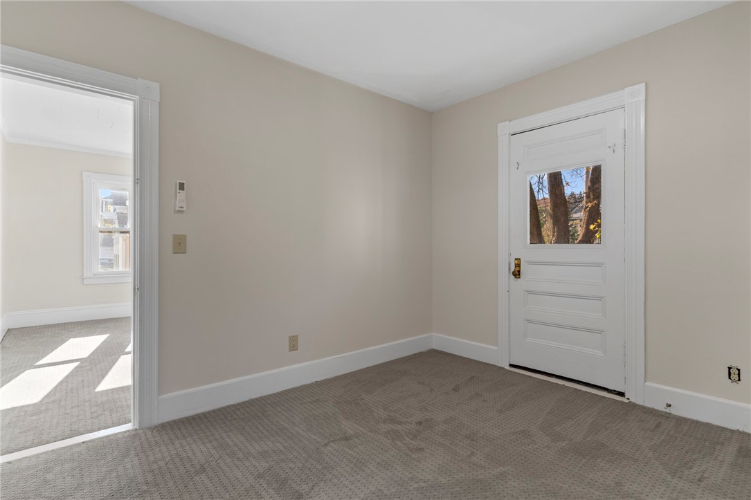 Unit 1 - Living room/ front entry