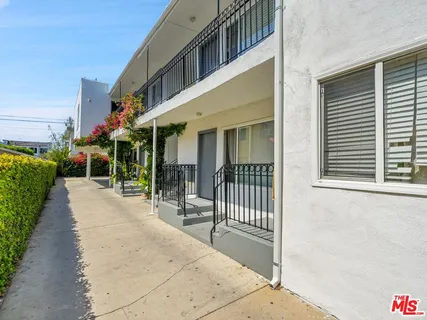 a view of a building with a porch