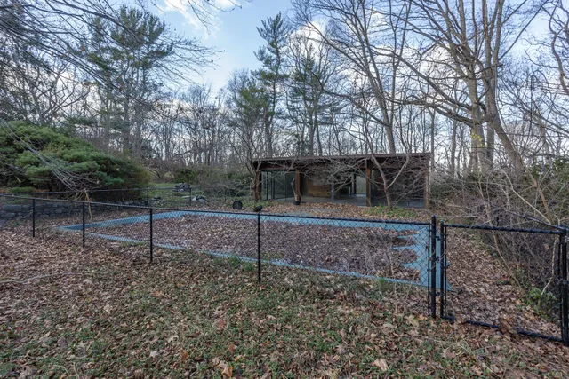 a backyard of a house with lots of green space
