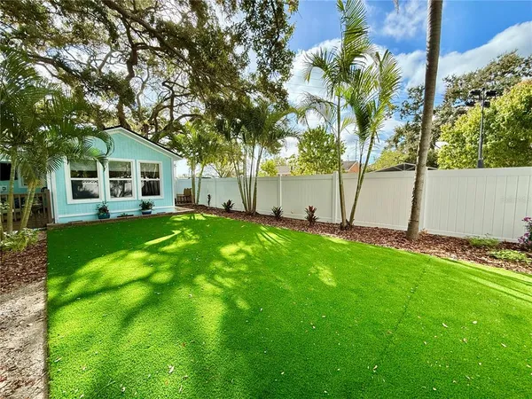 a view of a back yard with green space
